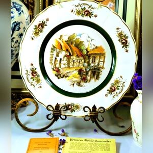 This beautiful and rare plate has the original notes and card from the